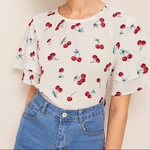Cherry blouse with detailed frilly sleeves